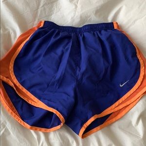 Purple/blue and orange Nike tempo shorts